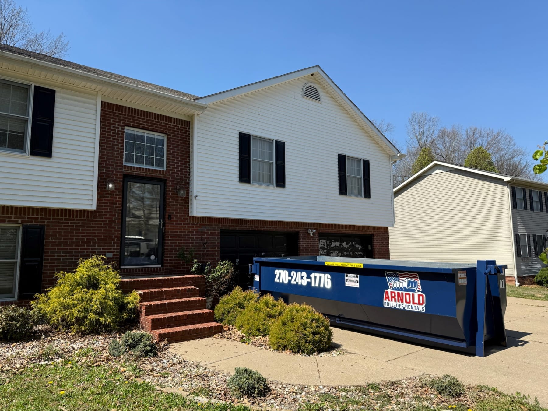 Dumpster in a home driveway in Paducah